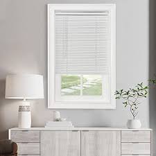 Photo 1 of  58 in. W x 64 in. L Cordless Light Filtering White Vinyl Mini Blind with 1 in. Slats