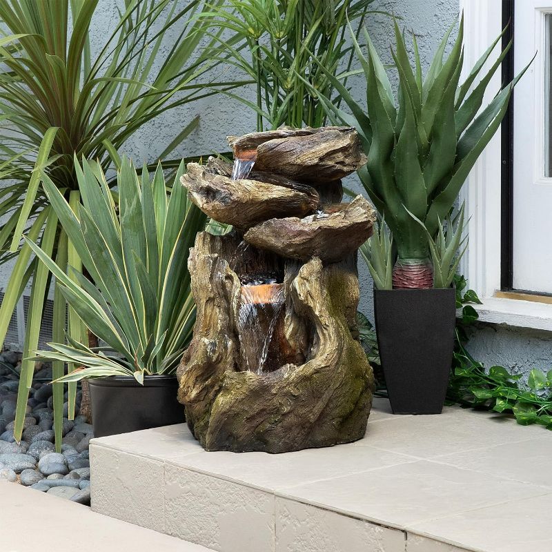 Photo 2 of **STOCK PHOTO FOR REFERENCE ONLY**
Alpine Corporation Log Fountain with LED Lights, 5-Tier Waterfall Garden Fountain Brown Rainforest 14" L