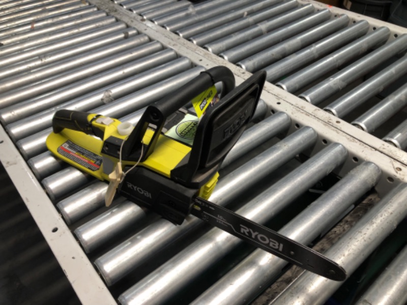 Photo 1 of ***USED AND DIRTY - MISSING OIL CAP AND CHAIN - UNABLE TO TEST - SEE PICTURES***
Ryobi P546 10 in. ONE+ 18-Volt Lithium+ Cordless Chainsaw, Battery Included