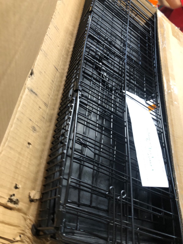 Photo 1 of Amazon Basics - Durable, Foldable Metal Wire Dog Crate with Tray, Single Door, 30 x 19 x 21 Inches, Black 30.0"L x 19.0"W x 21.0"H Single Door w/ Divider