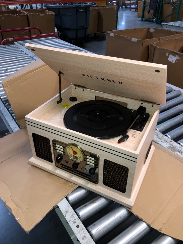 Photo 2 of **NONREFUNDABLE**FOR PARTS OR REPAIR**SEE NOTES**
Victrola Nostalgic 6-in-1 Bluetooth Record Player & Multimedia Center with Built-in Speakers - 3-Speed Turntable, CD & Cassette Player, FM Radio | Wireless Music Streaming | Natural Natural Record Player