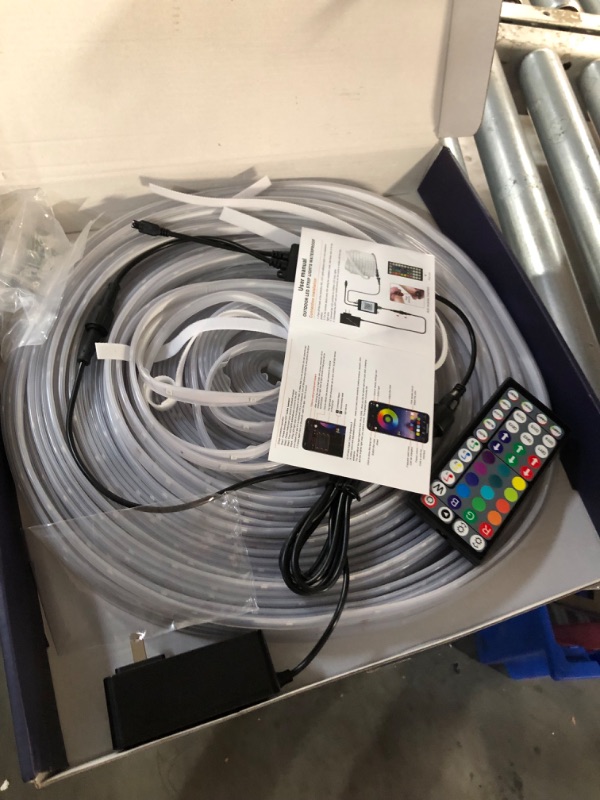 Photo 3 of ***USED - LIKELY MISSING PARTS - UNABLE TO VERIFY FUNCITONALITY***
200ft Outdoor LED Strip Lights Waterproof 1 Roll,IP68 Outside Led Light Strips Waterproof with App and Remote,Music Sync RGB Exterior Led Rope Lights with Self Adhesive Back for Deck,Balco