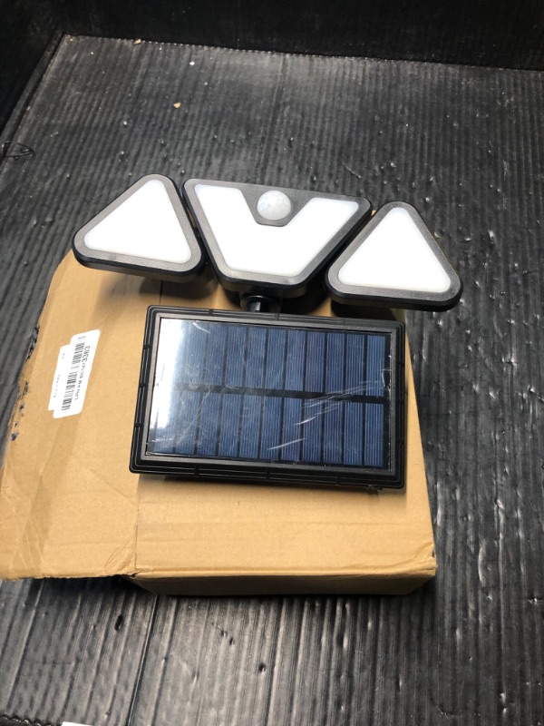 Photo 3 of ***USED - LIKELY MISSING PARTS - UNABLE TO VERIFY FUNCTIONALITY***
ZOOKKI Solar Outdoor Lights, 3 Heads Motion Sensor Outdoor Lights, 203 LED IP 65 Waterproof Solar Flood Security Lights for Front Door Yard Garage, 2 Pack