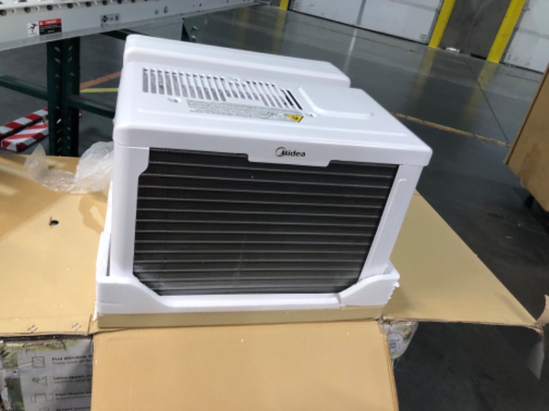 Photo 7 of ***USED - UNTESTED - SEE COMMENTS***
Midea 12,000 BTU U-Shaped Smart Inverter Air Conditioner–Cools up to 550 Sq. Ft., Ultra Quiet with Open Window Flexibility, Works with Alexa/Google Assistant, 35% Energy Savings, Remote Control 12000 BTU