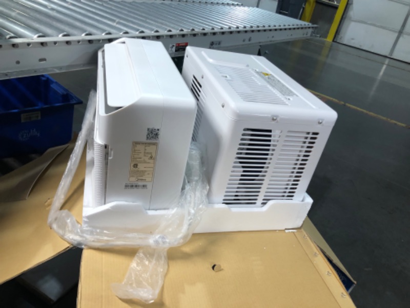 Photo 6 of ***USED - UNTESTED - SEE COMMENTS***
Midea 12,000 BTU U-Shaped Smart Inverter Air Conditioner–Cools up to 550 Sq. Ft., Ultra Quiet with Open Window Flexibility, Works with Alexa/Google Assistant, 35% Energy Savings, Remote Control 12000 BTU