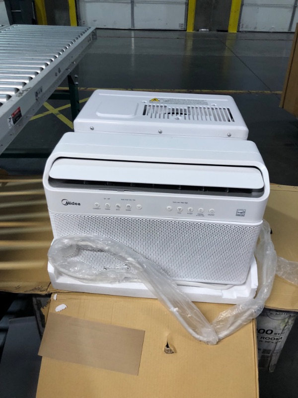 Photo 9 of ***USED - UNTESTED - SEE COMMENTS***
Midea 12,000 BTU U-Shaped Smart Inverter Air Conditioner–Cools up to 550 Sq. Ft., Ultra Quiet with Open Window Flexibility, Works with Alexa/Google Assistant, 35% Energy Savings, Remote Control 12000 BTU