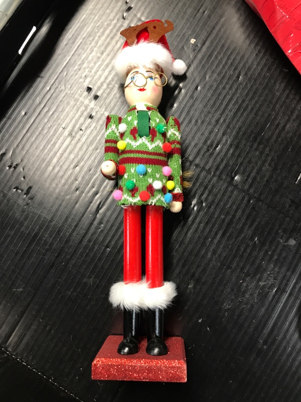 Photo 2 of ** LIGHT DAMAGE ** Ornativity Christmas Ugly Sweater Nutcracker – Red and Green Wooden Nutcracker Woman with an Ugly Sweater and Reindeer Hat Xmas Themed Holiday Nut Cracker Doll Figure Decorations 15"