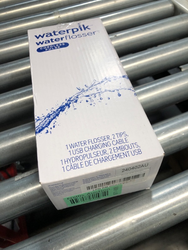 Photo 1 of *USED MISSING CHARGING CORD*Waterpik Cordless Pulse Rechargeable Portable Water Flosser for Teeth, Gums, Braces Care and Travel with 2 Flossing Tips, Waterproof, ADA Accepted, WF-20 White, Packaging May Vary White Flosser