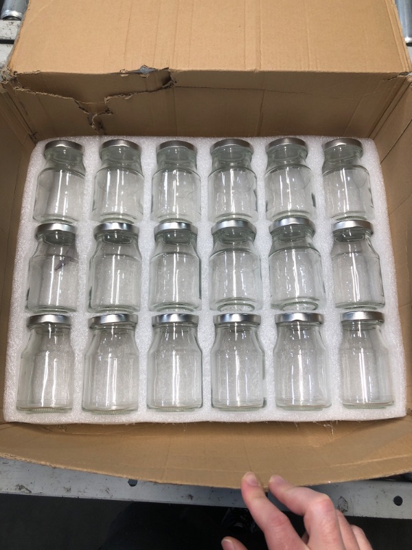 Photo 1 of (READ FULL POST) Accguan 6oz Glass Milk Bottles,Small Juice Bottles with Silver Caps,Jute Twine & Tag, Glass Yogert Jars Clear Glass Jars for Cake,Milk,Honey,Jam,Jelly,Spice,Wedding Favors,Shower Favors (18 Pack)