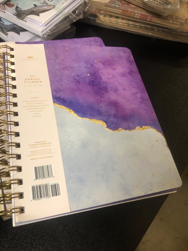 Photo 2 of 2024 Purple Annual Planner by Bright Day, Yearly Monthly Weekly Daily Spiral Bound Dated Agenda Flexible Cover Tabbed Notebook, 8.25 x 6.25