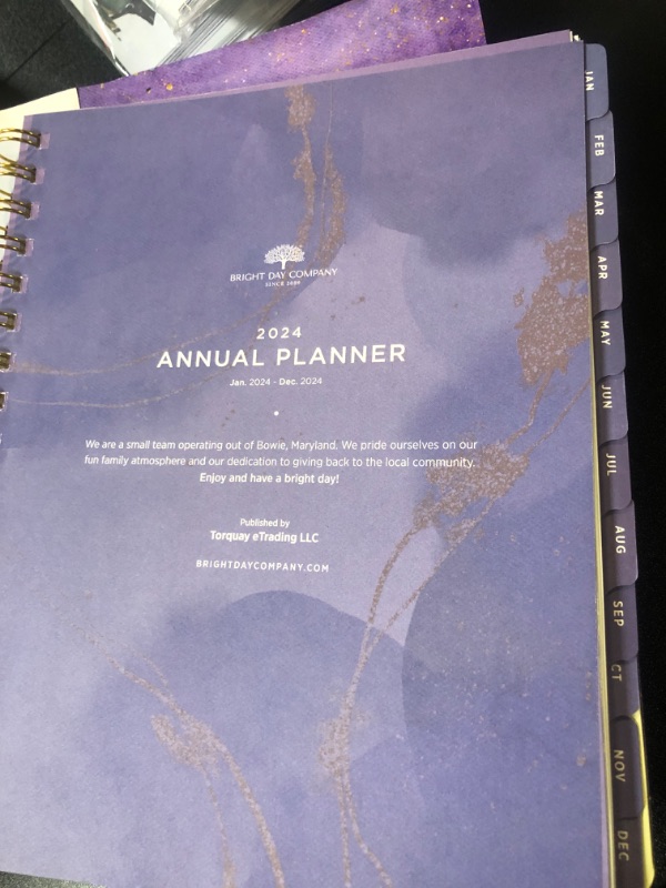 Photo 3 of 2024 Purple Annual Planner by Bright Day, Yearly Monthly Weekly Daily Spiral Bound Dated Agenda Flexible Cover Tabbed Notebook, 8.25 x 6.25