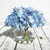 Photo 1 of 
LIVING LUXURY
7 in. Blue Artificial Hydrangea Flower Arrangement in Round Glass Vase