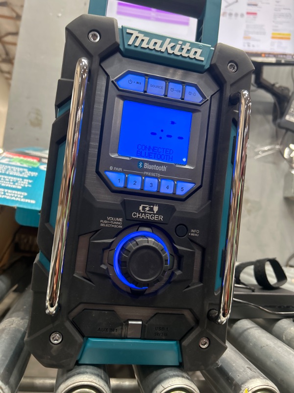 Photo 5 of **CONNECTED PERSONAL DEVICE , FUNCTIONAL**
Makita XRM10 18V LXT® / 12V max CXT® Lithium-Ion Cordless Bluetooth® Job Site Charger/Radio, Tool Only Speaker