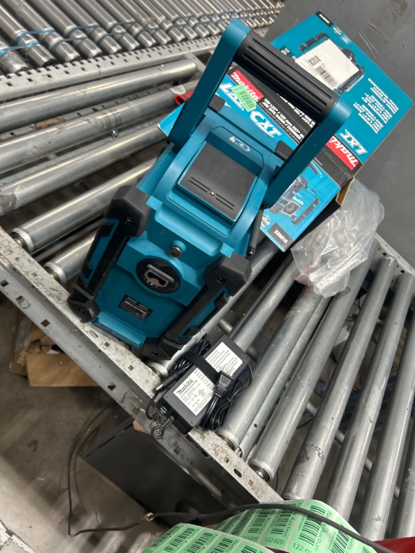 Photo 2 of **CONNECTED PERSONAL DEVICE , FUNCTIONAL**
Makita XRM10 18V LXT® / 12V max CXT® Lithium-Ion Cordless Bluetooth® Job Site Charger/Radio, Tool Only Speaker