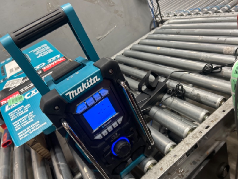 Photo 4 of **CONNECTED PERSONAL DEVICE , FUNCTIONAL**
Makita XRM10 18V LXT® / 12V max CXT® Lithium-Ion Cordless Bluetooth® Job Site Charger/Radio, Tool Only Speaker