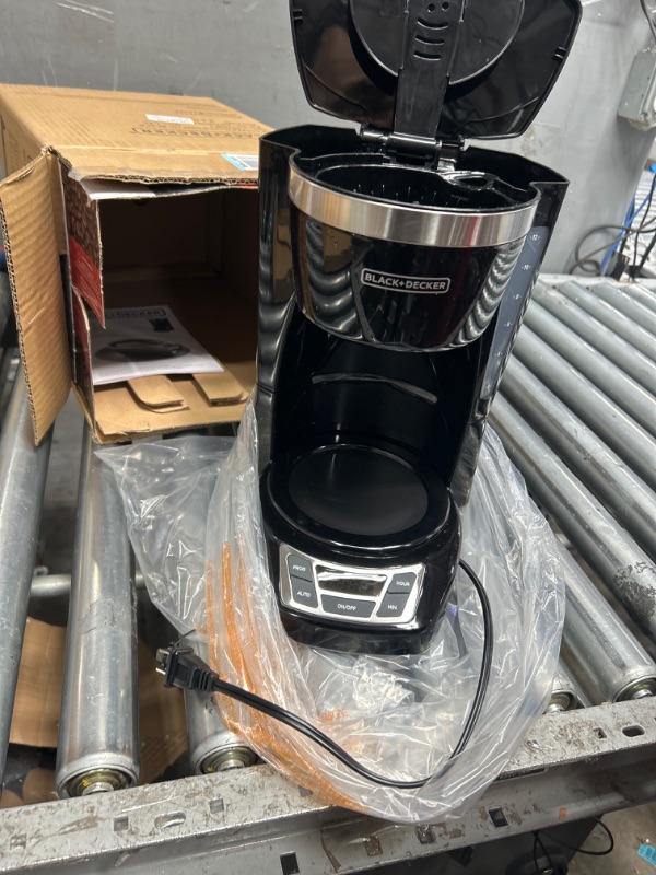 Photo 2 of **MESH FILTER ANDE COFFEE POT MISSING**
BLACK+DECKER 12-Cup Digital Coffee Maker, CM1160B, Programmable, Washable Basket Filter, Sneak-A-Cup, Auto Brew, Water Window, Keep Hot Plate, Black black/stainless steel