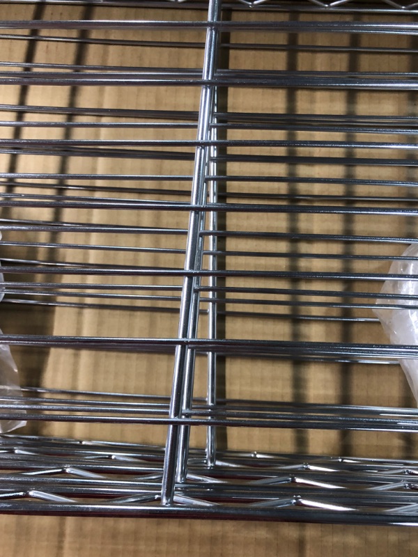 Photo 5 of ***USED - DAMAGED - PARTS WARPED AND OFF CENTER - SEE PICTURES - MISSING PARTS AS WELL***
4-Tier Steel Wire Shelving Unit in Chrome (36 in. W x 54 in. H x 14 in. D)