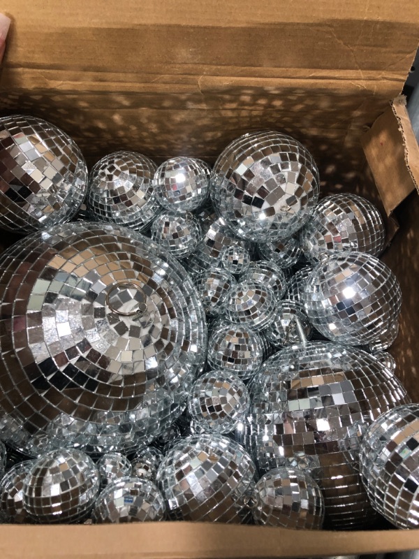 Photo 1 of 100 Pcs Mirror Disco Balls Decorations Different Sizes Bulk Silver Disco Balls Ornaments Hanging Disco Balls for Christmas Tree Dance Music 50s 60s 70s Disco Themed Party Decor (1, 2, 3, 4, 12)
