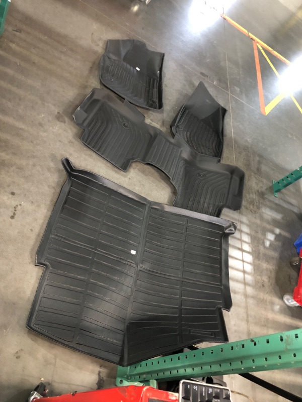 Photo 1 of ***UNABLE TO IDENTIFY WHAT MAKE AND MODEL OF VEHICLE THESE FLOOR MARTS GO TO - SEE PICTURES***
4 Piece Automotive Car Floor Mats, Second Row and Trunk Included