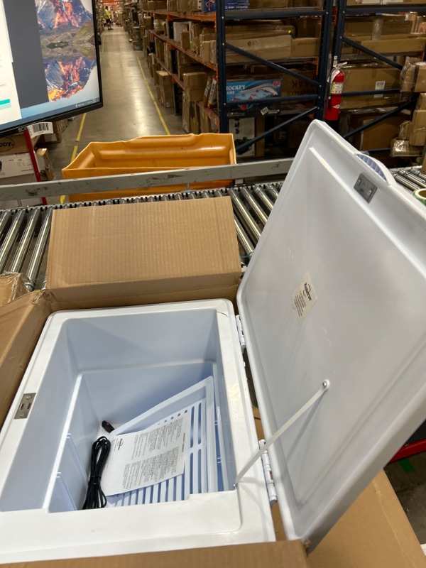Photo 1 of ****DOESNT COOL A LOT *****Koolatron Electric Portable Cooler Plug in 12V Car Cooler/Warmer 36 qt (34 L), No Ice Thermo Electric portable Fridge for camping, Travel Road Trips Trucking with 12 Volt DC Power Cord, Gray/White.