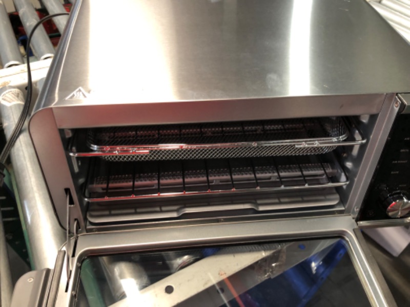 Photo 4 of ***USED - SCRATCHED AND DENTED - POWERS ON - UNABLE TO TEST FURTHER - LIKELY MISSING PARTS***
Ninja SP201 Digital Air Fry Pro Countertop 8-in-1 Oven with Extended Height, XL Capacity, Flip Up & Away Capability for Storage Space, with Air Fry Basket, Wire 