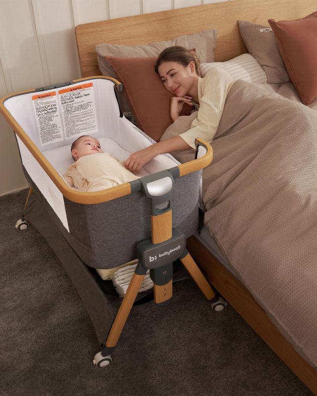 Photo 1 of 
babyboat Cozy2, Bedside Bassinet,Travel Bassinet with Bigger Wheels Portable Bassinet Sleeper with Skin-Friendly Mattress,5 Height Adjustable Bedside Crib...