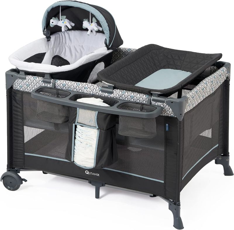 Photo 1 of ***USED MATTRESS PAD TORN***5 in 1 Multifunctional Pack and Play,Qutanix Foldable Baby Crib with Bassinets,Changing Table,Newborn Napper with Canopy,Diaper Stacker,Baby Playpen for Babies and Toddlers