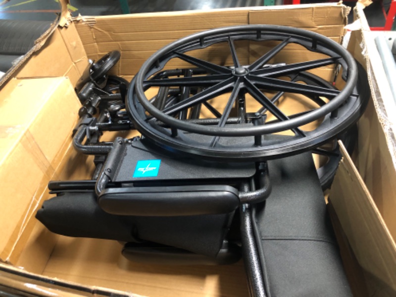 Photo 4 of **USED BROKEN WHEEL**Medline 20” Foldable K4 Wheelchair with Swing-Back Desk-Length Arms & Elevating Legrests, 300 lbs. Capacity, Transport Chair for Adults & Seniors 20" Seat Width