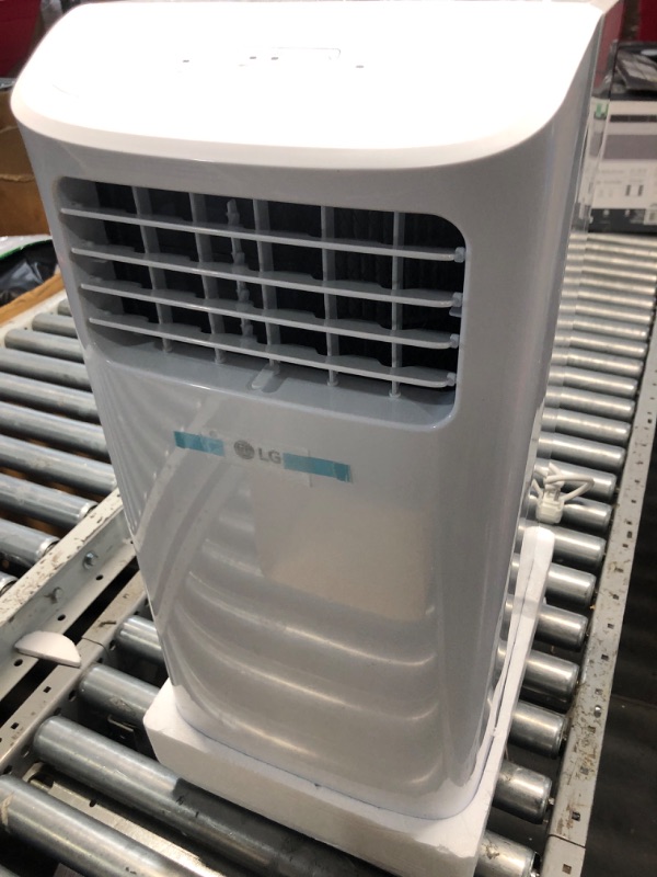 Photo 3 of ***(PARTS ONLY/ NON FUNCTIONAL/ NO RETURNS OR REFUNDS) ***
LG LP0624WFR Portable Air Conditioner w/Remote, Cools 250 Sq.Ft, Quiet Operation, 115V, 6,000 BTU (9700 ASHRAE), White