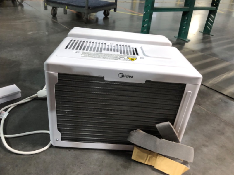 Photo 1 of ***USED - DAMAGED - SEE COMMENTS***
Midea 8,000 BTU U-Shaped Smart Inverter Air Conditioner –Cools up to 350 Sq. Ft., Ultra Quiet with Open Window Flexibility, Works with Alexa/Google Assistant, 35% Energy Savings, Remote Control