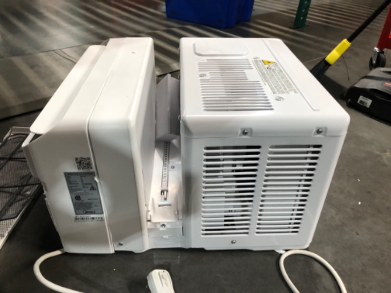 Photo 1 of ***USED - DAMAGED - SEE COMMENTS***
Midea 8,000 BTU U-Shaped Smart Inverter Air Conditioner –Cools up to 350 Sq. Ft., Ultra Quiet with Open Window Flexibility, Works with Alexa/Google Assistant, 35% Energy Savings, Remote Control