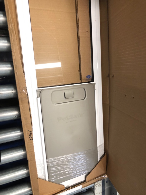 Photo 2 of ***USED - LIKELY MISSING PARTS - UNABLE TO VERIFY FUNCTIONALITY***
PetSafe Dog Door for Sliding Glass Door (Medium) Doggie Door for Sliding Door Aluminum Patio Panel Insert, Flap Opening for Pets Up to 40 lb. Doggy Door for Sliding Glass Doors - White