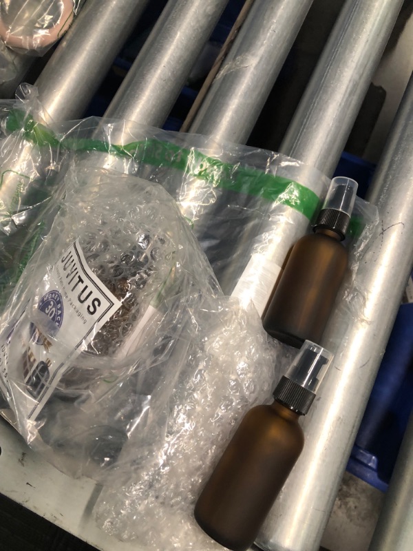 Photo 1 of (missing 2) JUVITUS 2 oz Frosted Amber Glass Boston Round Bottle Black Treatment Pump (4pack)