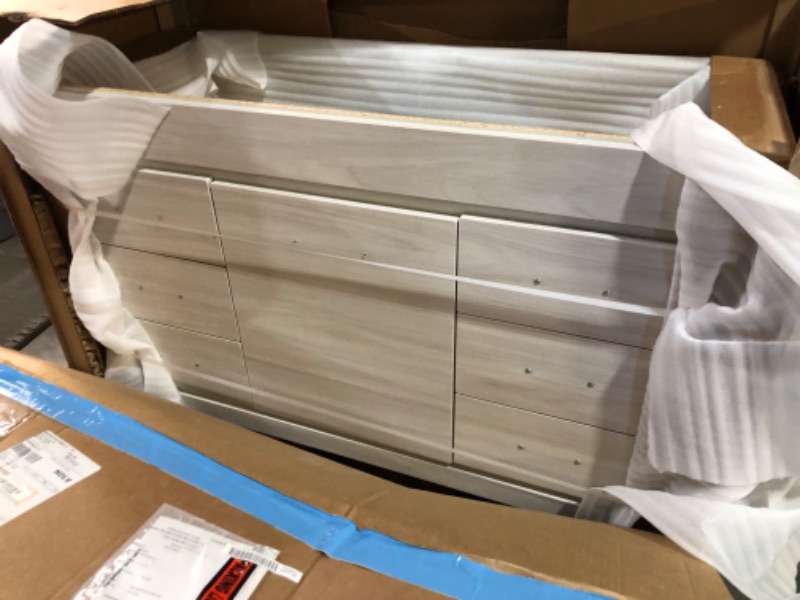 Photo 4 of ****TRUCK/TRAILER PICK UP REQUIRED. ITEM IS SOLD WITHOUT COUNTER TOP/ SINK AS WAS DAMAGED IN SHIPPING.***
Home Decorators Collection
Warford 48 in. W x 19 in. D x 33 in. H Single Sink Freestanding Bath Vanity in Elm Sky with White Cultured Marble Top