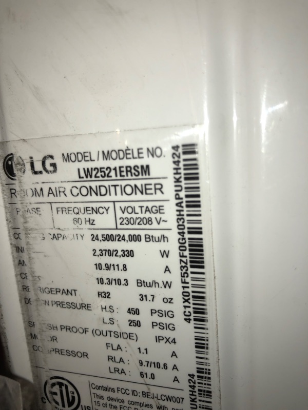 Photo 2 of ***NO FOAM / REMOTE***
LG 24,500 BTU 230/208V Window Air Conditioner Cools 1550 Sq. Ft. with Wi-Fi, Remote and in White