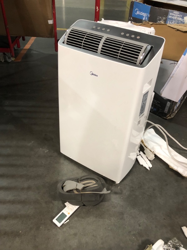 Photo 7 of ***DAMAGED - UNTESTED - MISSING PARTS - SEE COMMENTS***
Midea Duo 14,000 BTU (12,000 BTU SACC) High Efficiency Inverter Quiet Portable Air Conditioner,with Heat up to 550 Sq. Ft.,white, Works with Alexa/Google Assistant, with Remote Control & Window Kit W