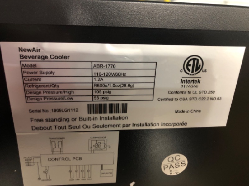 Photo 5 of ***USED - COVERED IN DENTS - POWERS ON - UNABLE TO TEST FURTHER***
NewAir Beverage Refrigerator Cooler with 177 Can Capacity - Stainless Steel Mini Bar Beer Fridge with Reversible Hinge Glass Door - Cools to 37F