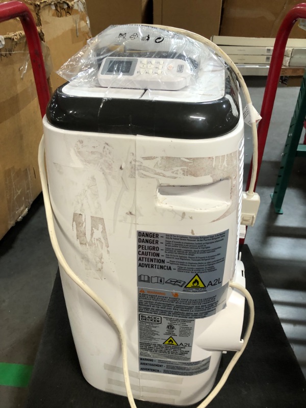 Photo 6 of ***NONREFUNDABLE - THIS SALE FINAL -  PARTS ONLY - SEE COMMENTS***
BLACK+DECKER 8,000 BTU Portable Air Conditioner with Remote Control, White