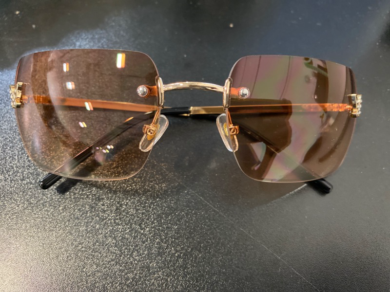 Photo 1 of knliwkm Rimless Rectangle Y2k Sunglasses for Women Men Cute Small Frameless Blue Tinted Lens 2000S Fashion Shades with Butterfly
