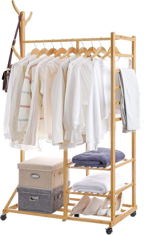 Photo 1 of Homde Clothing Rack Bamboo Garment Rack Rolling Coat Rack Multifunctional Bedroom Hanging Rack Clothing Organizer Hat Tree 3 Layers Wardrobe Storage Shelves with Wheels 6 Hooks (Natural)