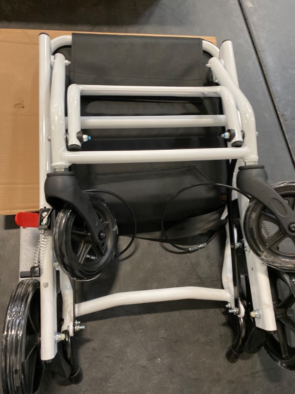 Photo 2 of (only 15lb) Super Lightweight Transport Wheelchair. Easy to Travel, Locking Hand Brakes, User-Friendly, Folding, Portable. for Adults or Child (up to 220lbs)) …