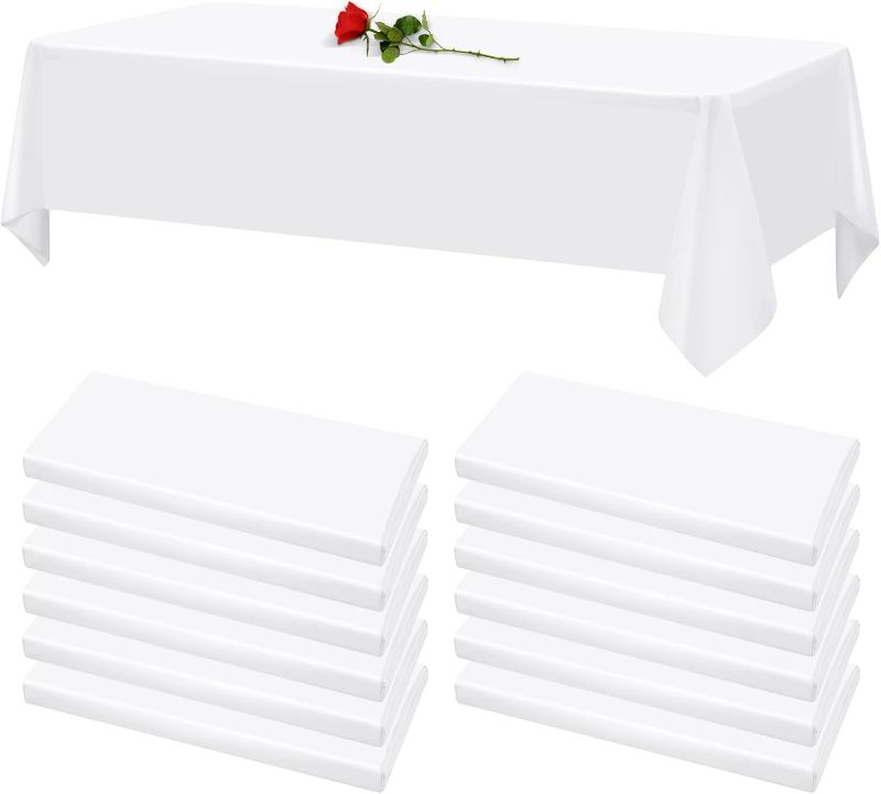 Photo 1 of 12 Pack White Tablecloths for Rectangle Tables Stain and Wrinkle Resistant Washable Polyester Tablecloth 60 x 126 Inch Table Cloth Rectangle Table 8 Foot Rectangle Table Cloth for Wedding Party