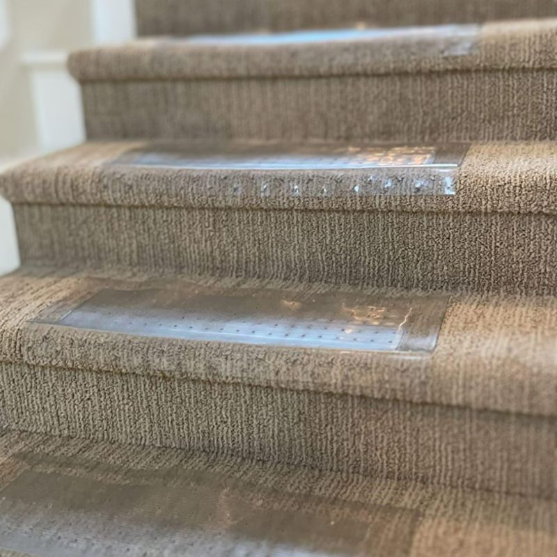 Photo 1 of Clear Stair Treads Carpet Protectors Set of 2-24 x 8 Inches, Slip Resistant with Gripper Teeth, Transparent Vinyl Treads for Carpeted Stairs Protection