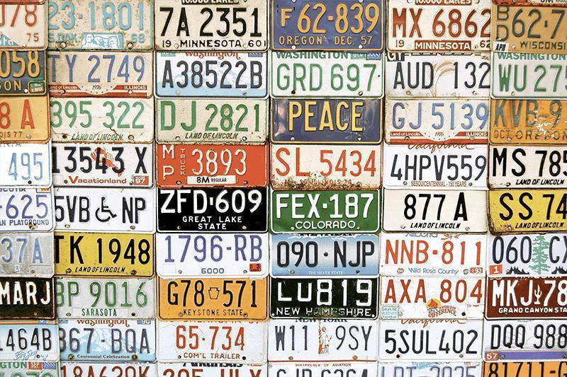 Photo 1 of Multicolored License Plates Vinyl Peel and Stick Wallpaper Roll (Covers 30.75 sq. ft.)