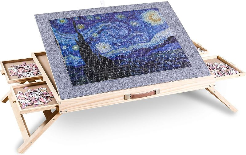 Photo 1 of 1500 Piece Jigsaw Puzzle Board - Wooden Puzzle Table with Cover - 3-Tilting-Angle Adjustable and 4 Drawers - 34” X 25” Jigsaw Puzzle Board Portable and Felted Anti-Skid Surface