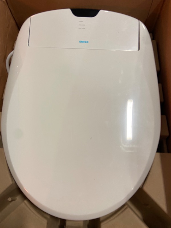 Photo 2 of The Omigo Luxury Bidet Toilet Seat Ergonomic Quiet-close Heated Seat with Massaging Oscillation, Ion Nozzle Cleaning, Air Dryer, and Remote Control (Round)