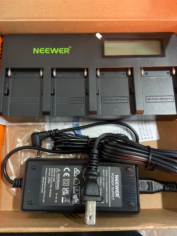 Photo 2 of Neewer 4-Channel NP-F Battery Charger with LCD Screen & Power Adapter, Compatible with Sony NP-F550 F570 F750 F770 F930 F950 F960 F970 FM50 FM500H QM71 QM91 QM71D QM91D Camcorder Li-ion Batteries