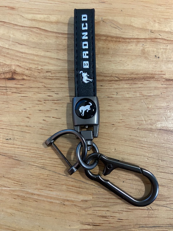 Photo 2 of for Ford Bronco Logo in Black on Black Leather Loop-Strap Dark Gunmetal Hook Key Chain