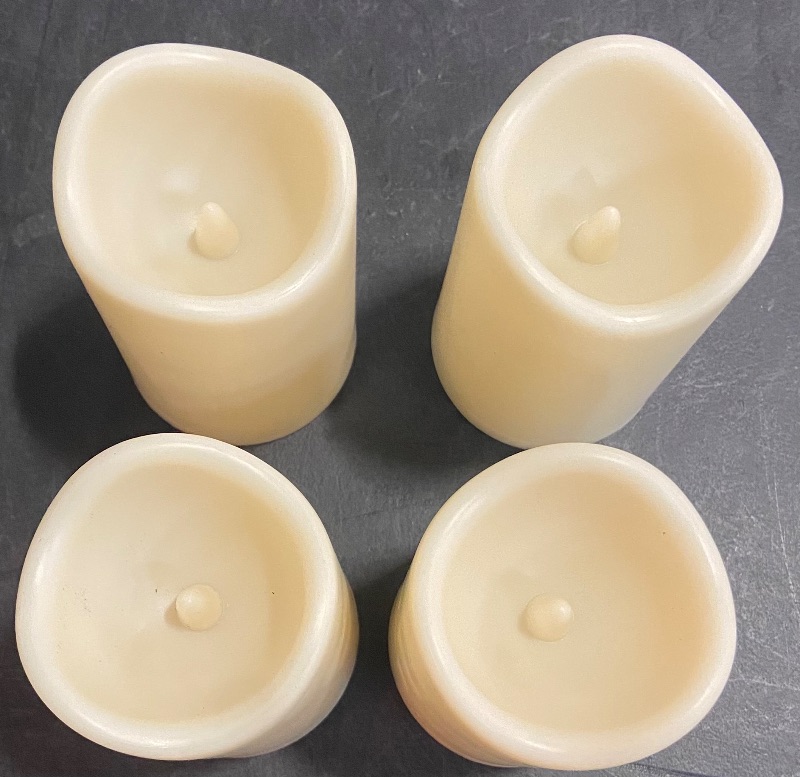 Photo 2 of 4-Pack Ivory Moving Flame Pillar Flameless LED Candle, Scalloped Edge,Plastic, Unscented, Timer (3" x 4.5")