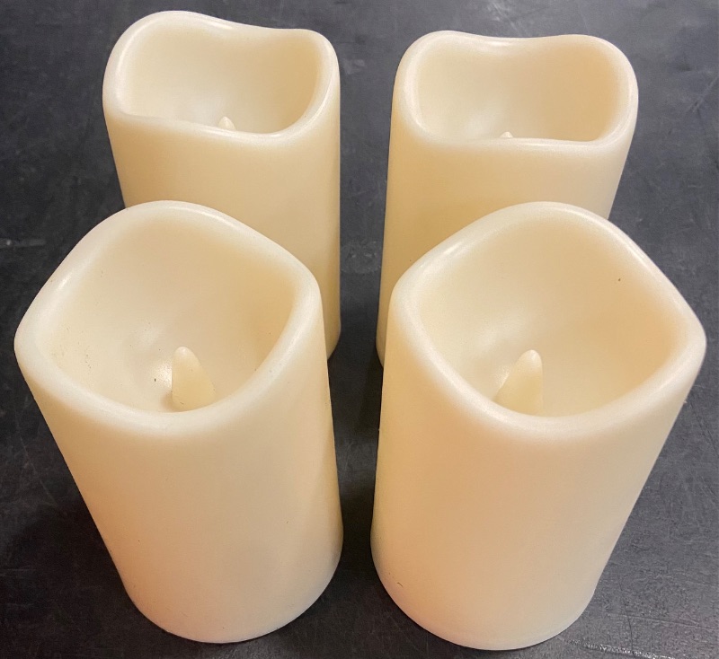 Photo 3 of 4-Pack Ivory Moving Flame Pillar Flameless LED Candle, Scalloped Edge,Plastic, Unscented, Timer (3" x 4.5")